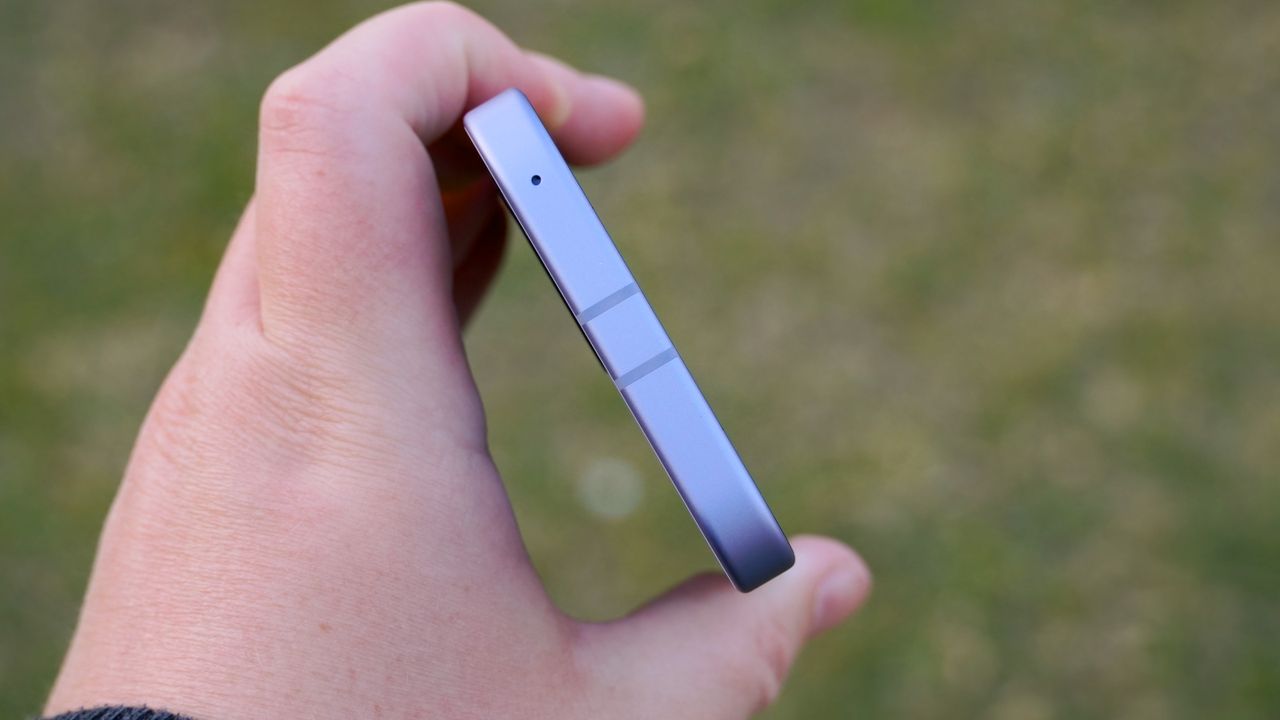 The Google Pixel 9a showing the top and antenna bands.