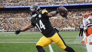 Kenneth Gainwell #14 of the Pittsburgh Steelers scores a first quarter touchdown against the Cincinnati Bengals at Acrisure Stadium on November 16, 2025 in Pittsburgh, Pennsylvania.