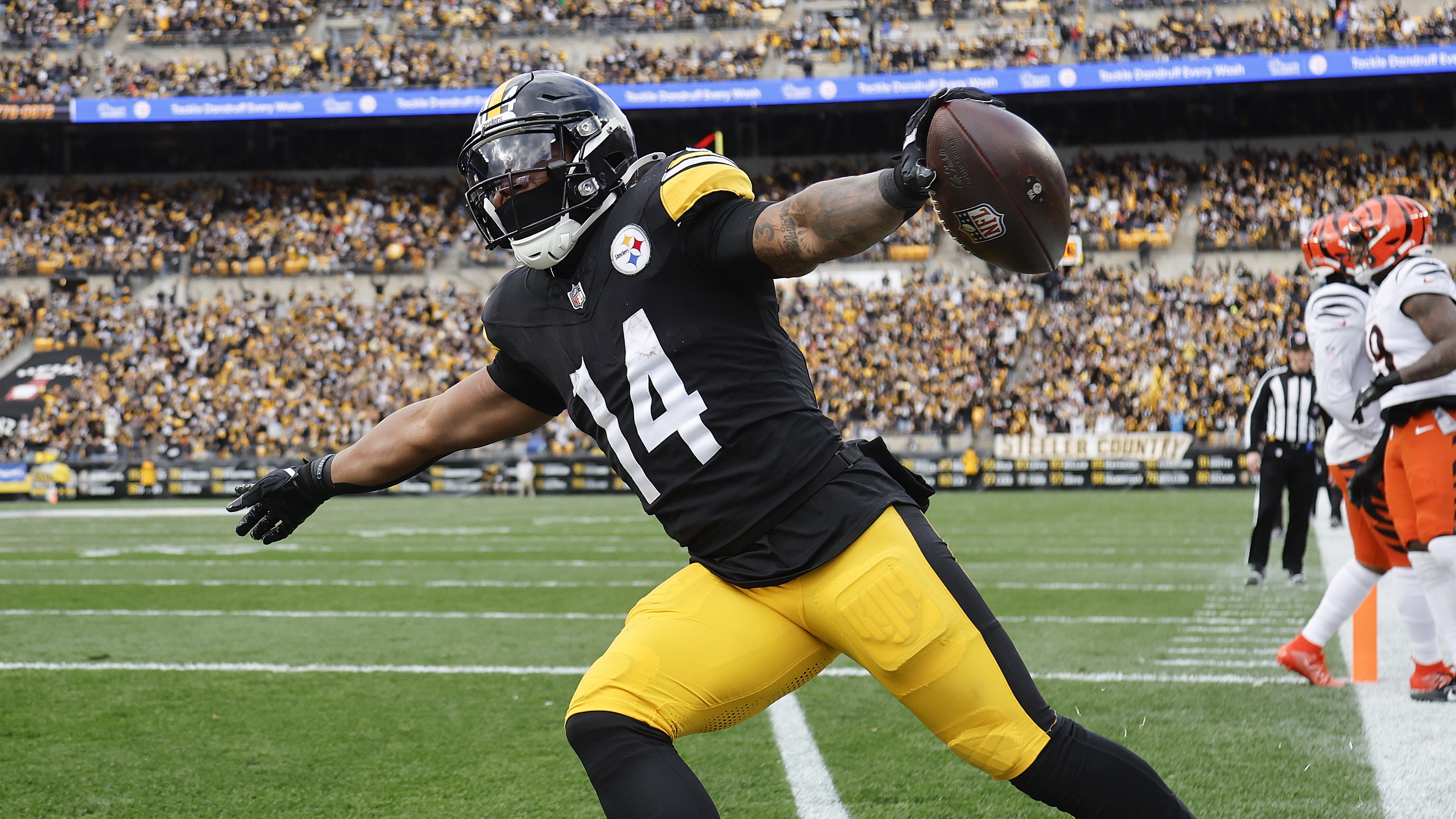 Kenneth Gainwell #14 of the Pittsburgh Steelers scores a first quarter touchdown against the Cincinnati Bengals at Acrisure Stadium on November 16, 2025 in Pittsburgh, Pennsylvania.