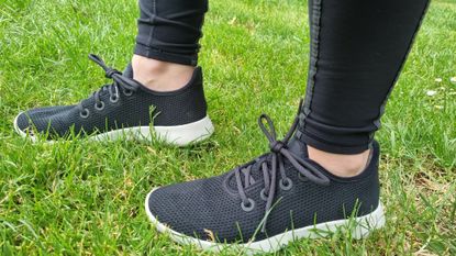 Allbirds Tree Runner shoes being worn on grass