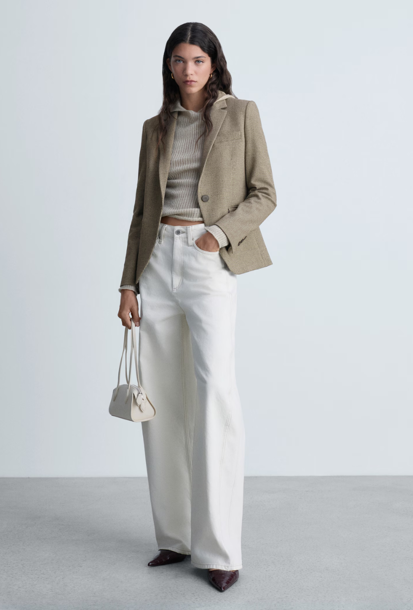 An image of a waisted blazer from Mango.