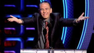 Comedian Gilbert Gottfried speaks onstage during the Comedy Central Roast of Roseanne Barr at Hollywood Palladium on Aug. 4, 2012. Gottfried died of a heart condition, his rep said on April 12, 2022.