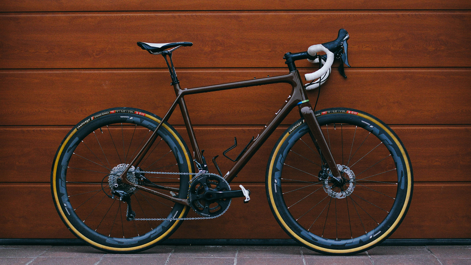 Road Bike leaning against a wall