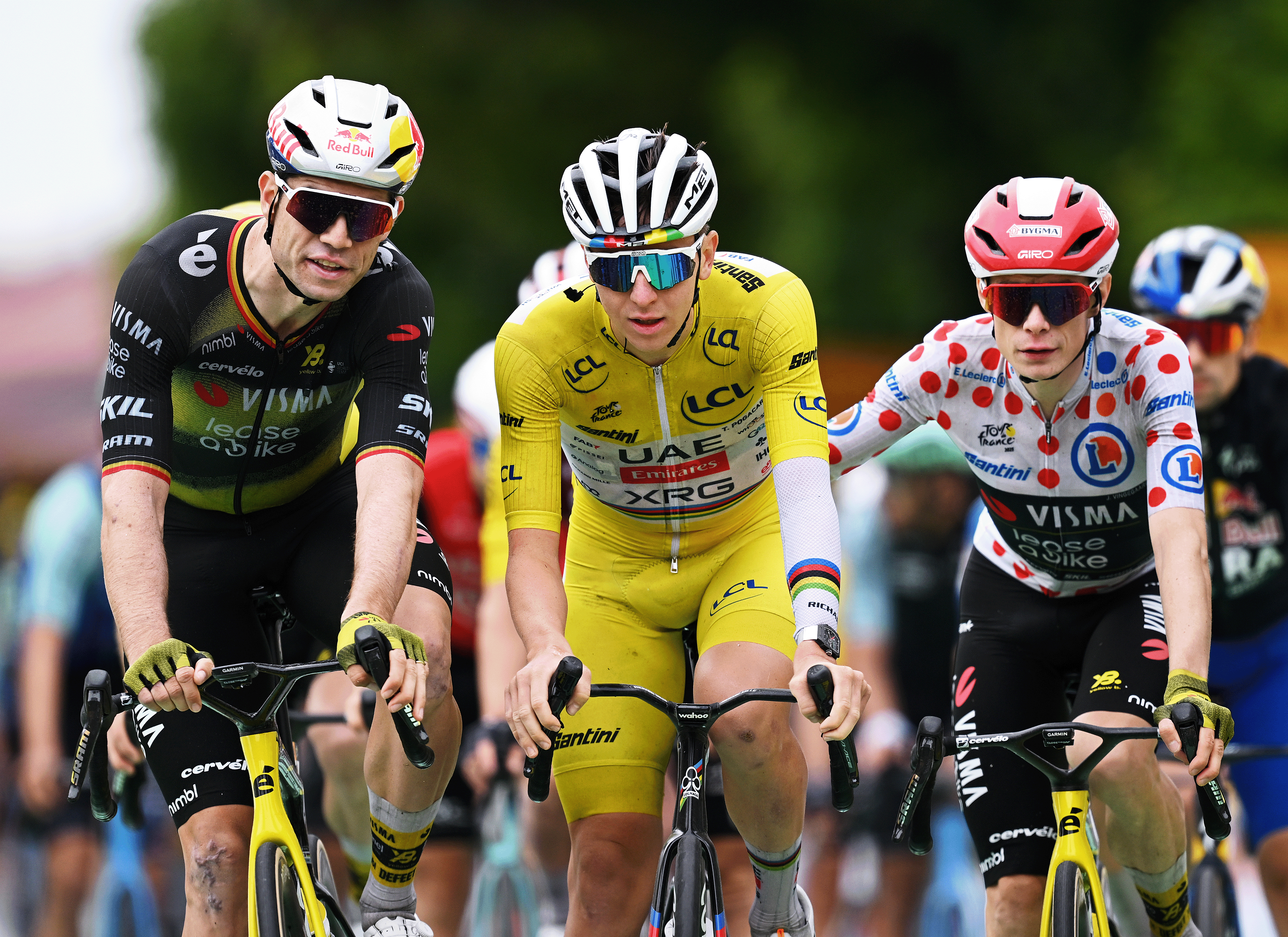 PONTARLIER, FRANCE - JULY 26: (L-R) Wout Van Aert of Belgium and Team Visma | Lease a Bike, Tadej Pogacar of Slovenia and UAE Team Emirates - XRG - Yellow Leader Jersey and Jonas Vingegaard of Denmark and Team Visma | Lease a Bike - Polka Dot Mountain Jersey cross the finish line during the 112th Tour de France 2025, Stage 20 a 184.2km stage from Nantua to Pontarlier / #UCIWT / on July 26, 2025 in Pontarlier, France. (Photo by Dario Belingheri/Getty Images)