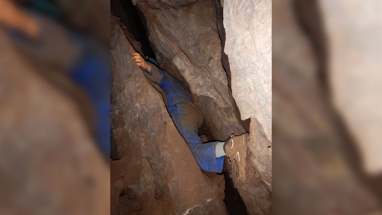 Research team members exploring the cave had to squeeze through spaces barely 6 inches (15 cm) wide when exploring the labyrinth of passages where Leti was found.