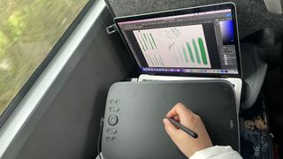 Ugee M908 review; using a drawing tablet on a bus