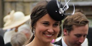Pippa Middleton high fashion with hat and earrings