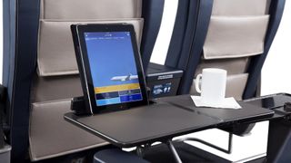 Some airlines now offer built-in device holders. Credit: United Airlines