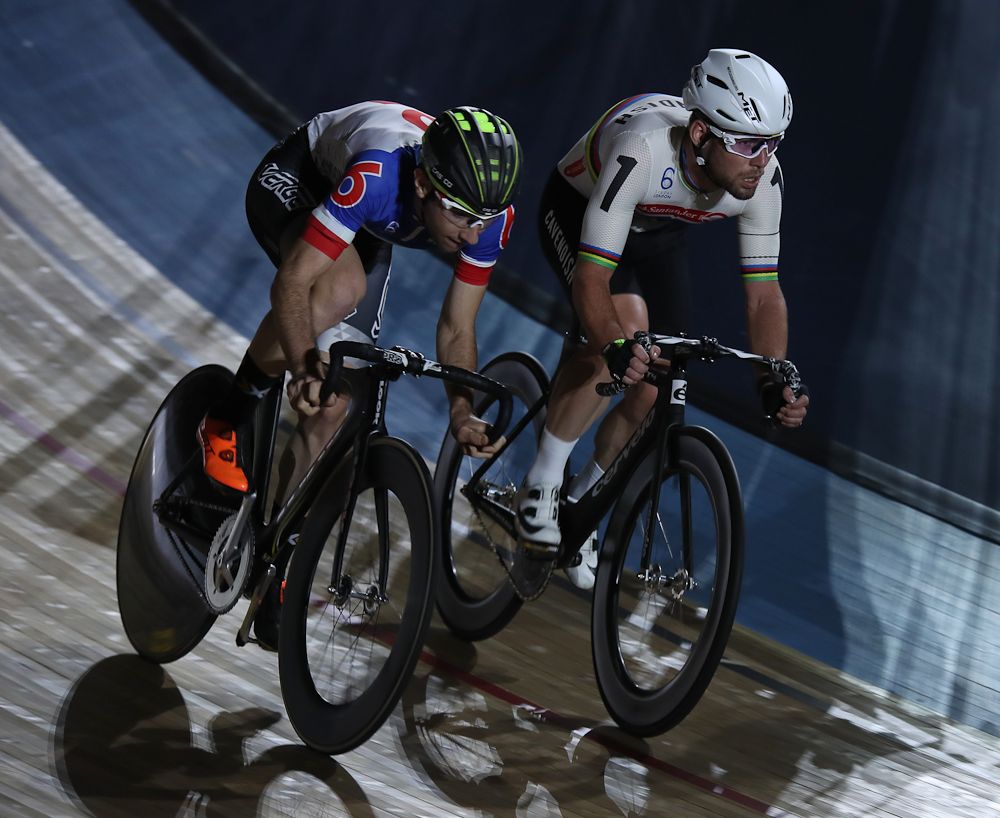 Morgan Kneisky of France and Mark Cavendish of Great Britain compete in the Madison chase during day one of the Six Day London
