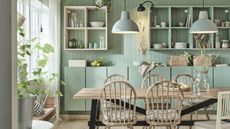 Pale green IKEA kitchen with a farmhouse style and wooden accents