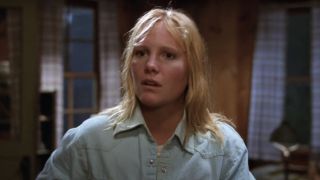 Amy Steel as Ginny Field in a Camp Crystal Lake cabin in Friday the 13th Part 2