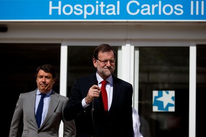 Spanish nurse, dozens in Dallas case appear to be Ebola-free