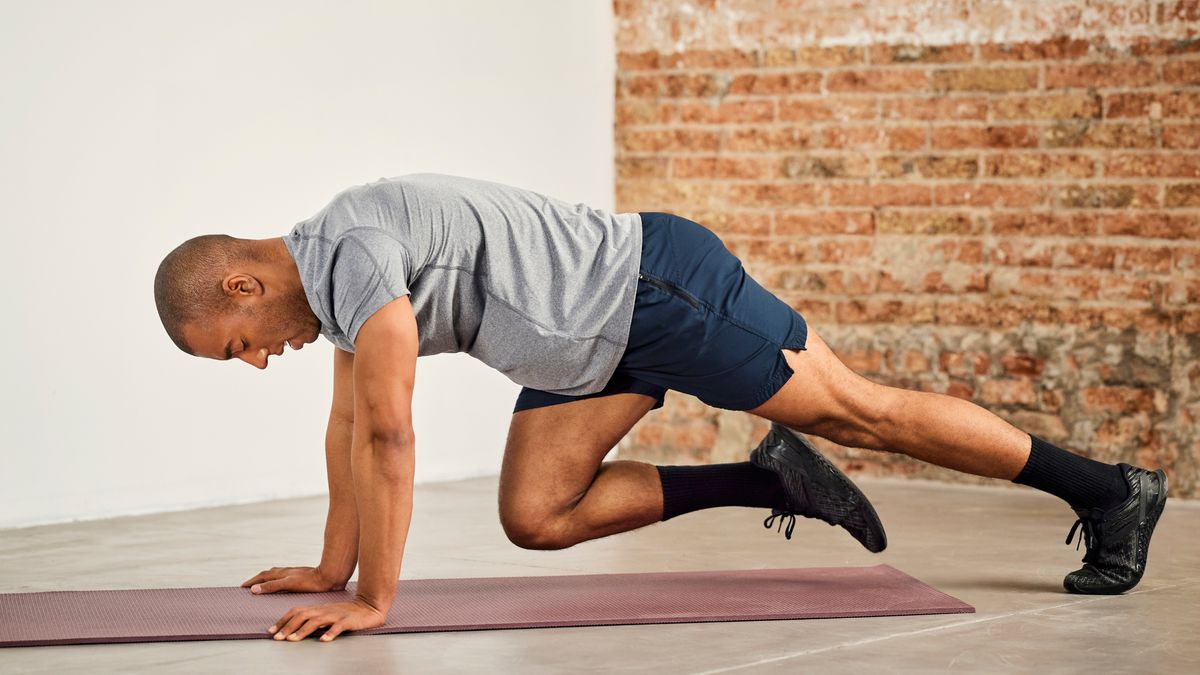 a man performing mountain climbers