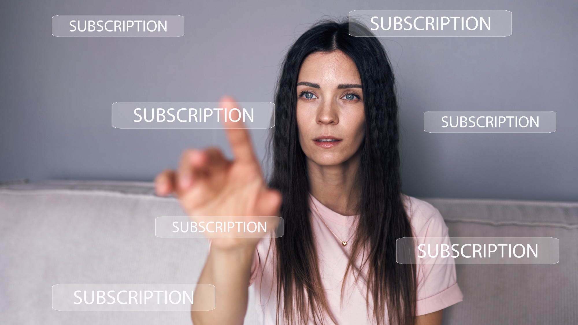 Woman interacting with a holographic screen, selecting an online subscription plan