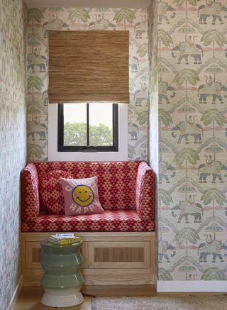 A child's bedroom with snug window seat