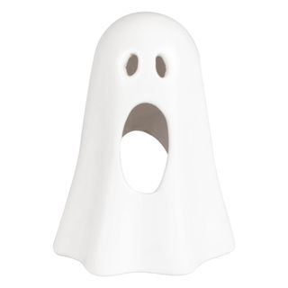 A candle holder in the shape of a ghost