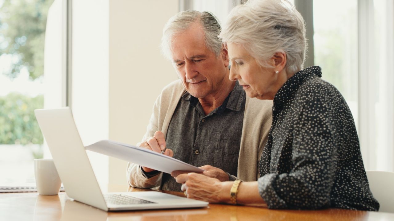 Older couple looking at computer