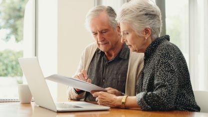 Older couple looking at computer