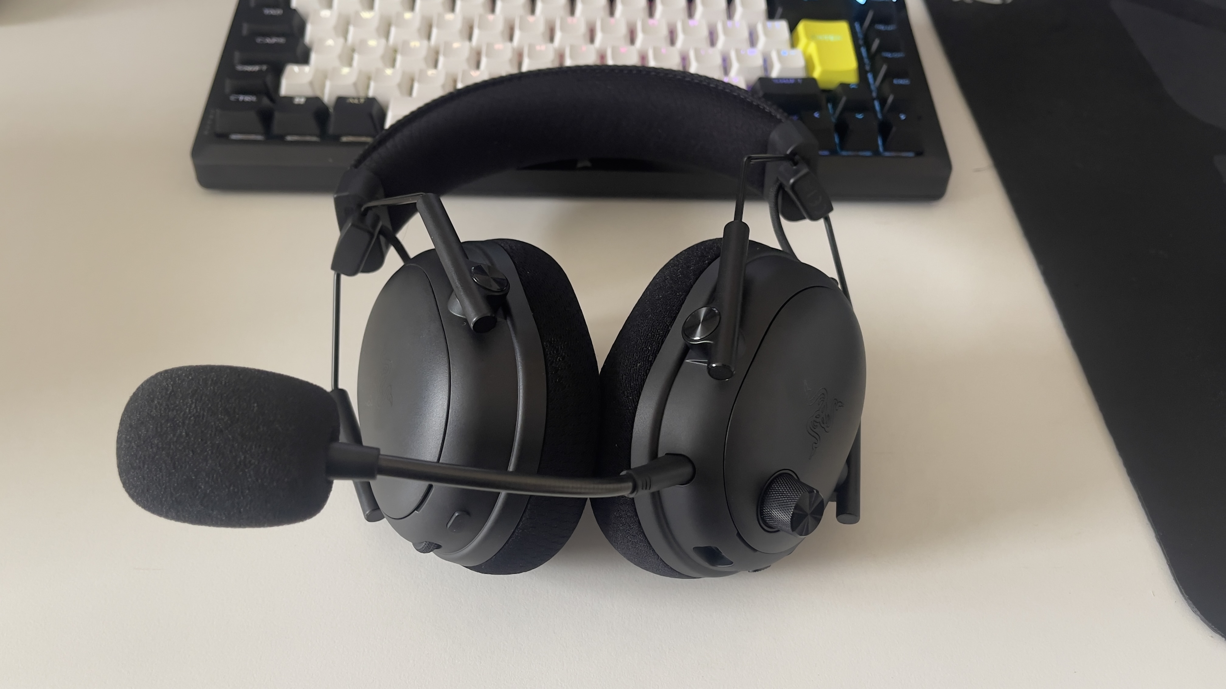 The Razer BlackShark V3 Pro headset on a desk