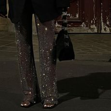 @daniellejinadu wearing sequin trousers