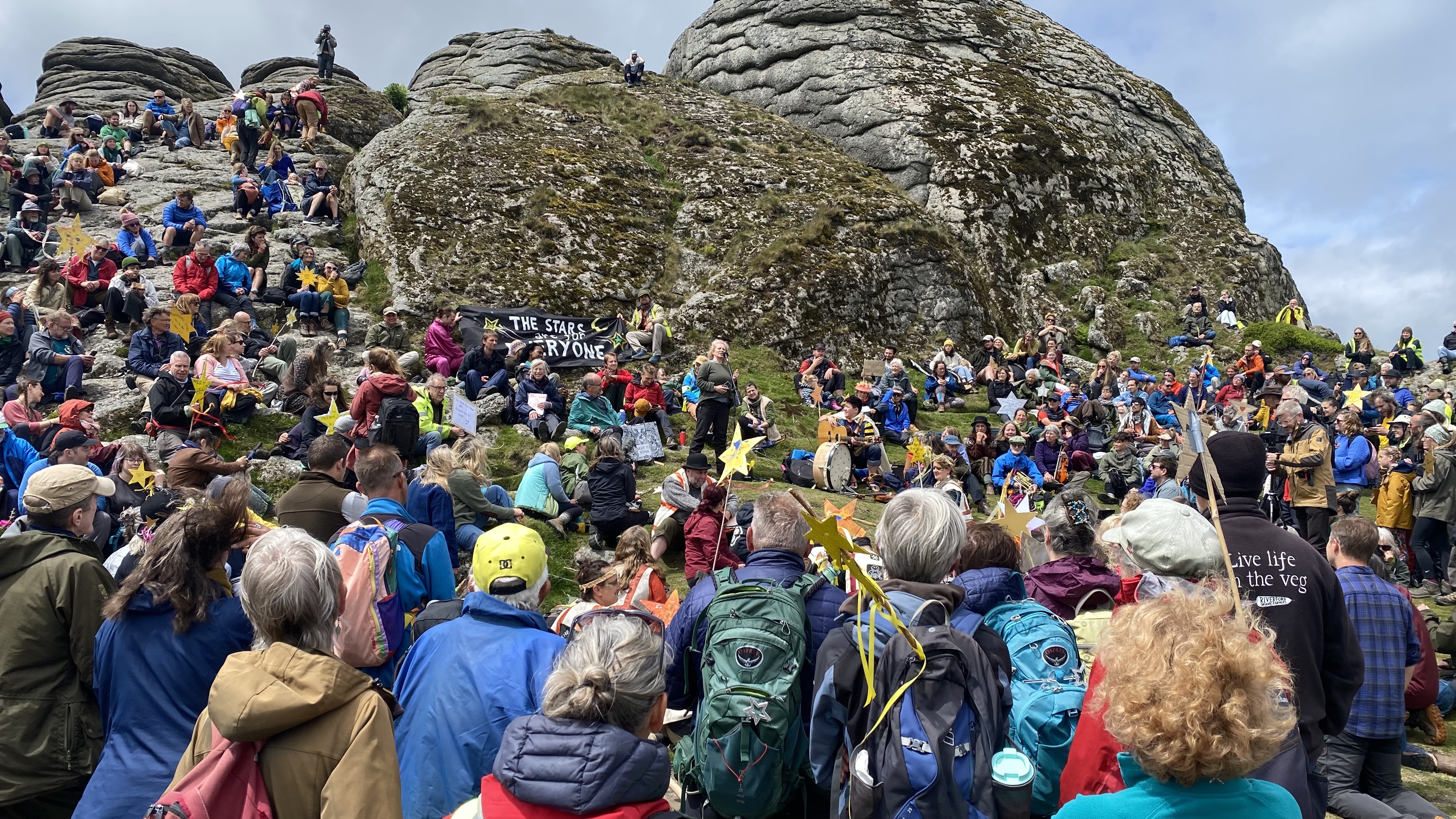 Access campaigners gather on Haytor, Dartmoor, to celebrate the continuation of the legal right to wild camp