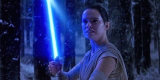 Rey with lightsaber force awakens