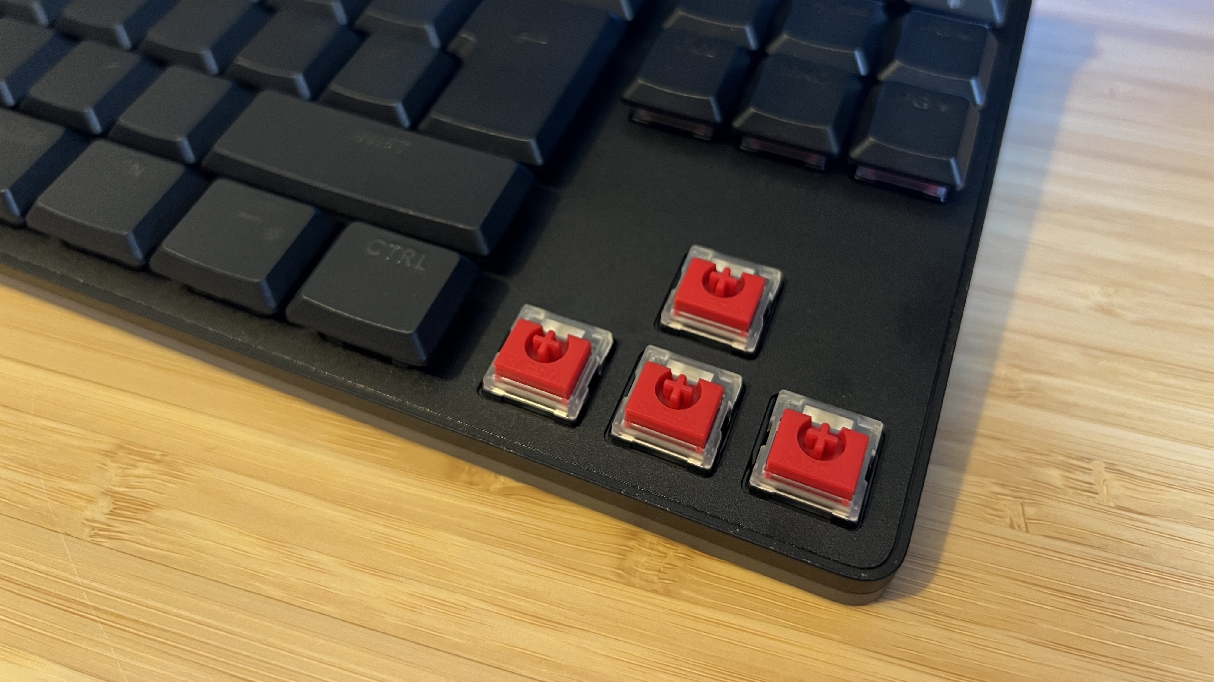 Close up on switches inside Logitech G515 Rapid TKL gaming keyboard