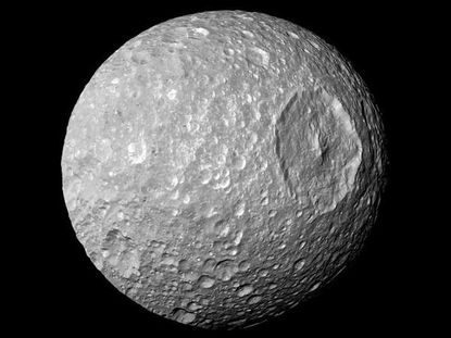 Researchers attempt to solve the mystery of what's inside Mimas, one of Saturn's moons