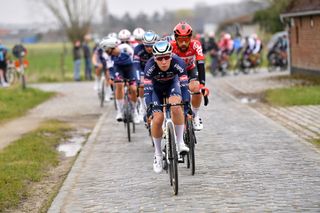 NOKERE BELGIUM MARCH 16 Fabio Van Den Bossche of Belgium and Team AlpecinFenix and Thomas De Gendt of Belgium and Team Lotto Soudal lead the peloton during the 76th Danilith Nokere Koerse 2022 Mens Elite a 1898km one day race from Deinze to Nokere NokereKoerse DNK22 on March 16 2022 in Nokere Belgium Photo by Luc ClaessenGetty Images