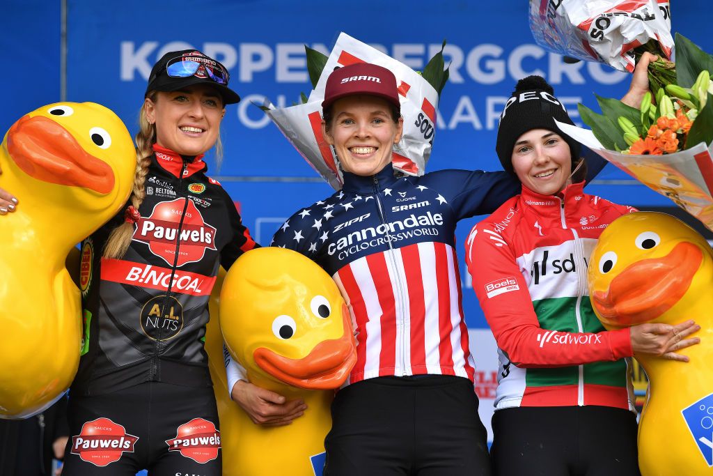 OUDENAARDE BELGIUM NOVEMBER 01 LR Denise Betsema of The Netherlands and Team Pauwels Sauzen Bingoal on second place race winner Clara Honsinger of The United States and Team CannondaleCyclocrossworld and Blanka Vas Kata of Hungary Team SD Worx on third place pose on the podium ceremony after the 32nd Koppenbergcross Grand Prix Jolien Verschueren 2021 Womens Elite Koppenbergcross Oudenaarde X2OBadkamersTrofee on November 01 2021 in Oudenaarde Belgium Photo by Luc ClaessenGetty Images