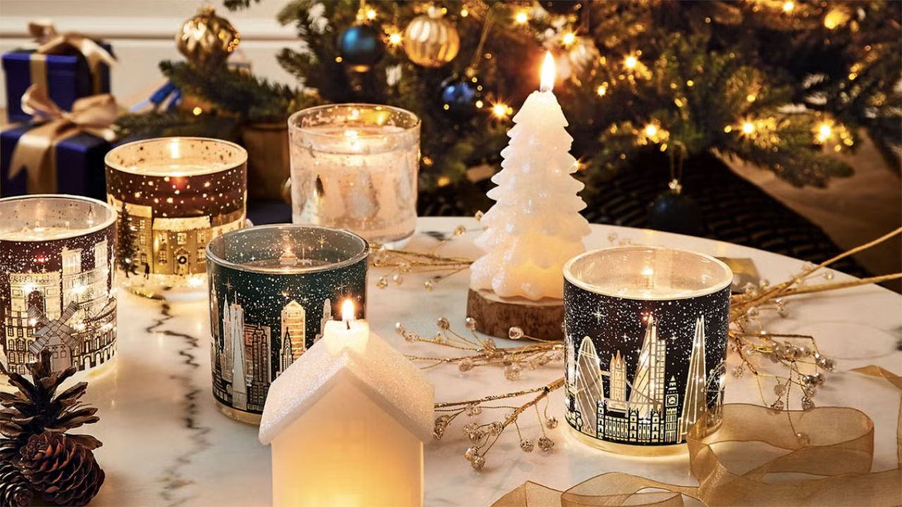 M&amp;S light up candles on marble table