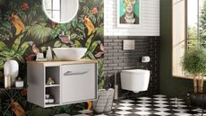 Green bathroom design with printed wallpaper and checkered floor tiles