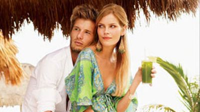 couple drinking in tropical location