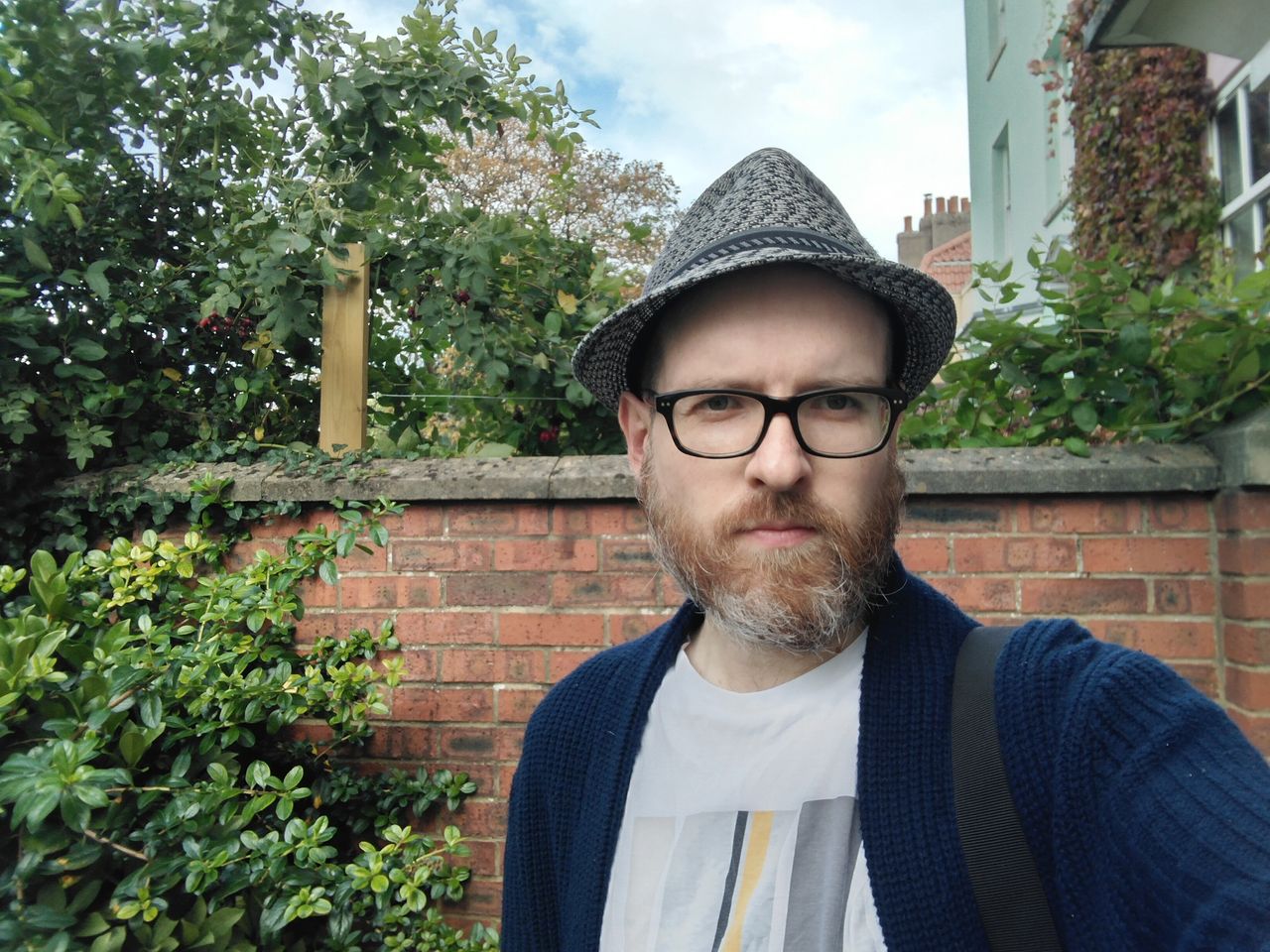 A photo of a man taking a selfie