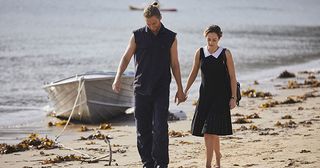Tori Morgan and Ash Ashford share a happy moment on the beach in Home and Away.