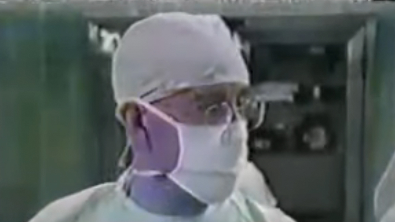 Harry Morgan in surgical scrubs in AfterMASH