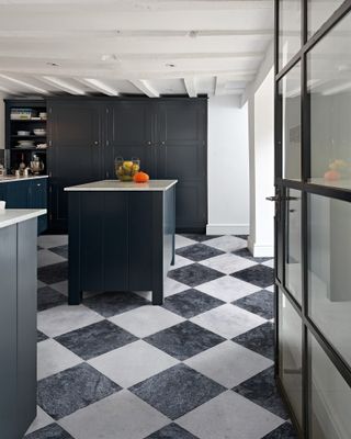 Checkerboard flooring, black and white kitchen