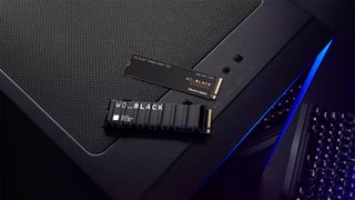 WD Black SN850X SSD on a gaming PC case.