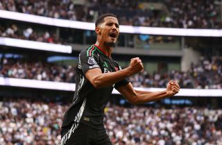 William Saliba Arsenal defender celebrates in the Premier League against Tottenham Hotspur as Real Madrid target him