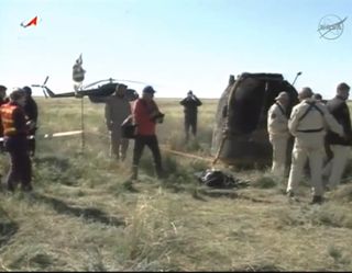 The Soyuz TMA-07M space capsule that returned the three-man crew of Expedition 35 home from the International Space Station is seen after landing on the steppes of Kazakhstan on May 14, 2013 (May 13 EDT).