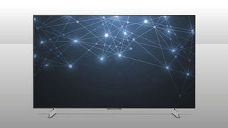 LG OLED42C3 TV with a blue image featuring a bright constellation-like pattern on the screen