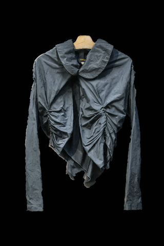A digitally rendered Comme des Garçons shirt on a black background