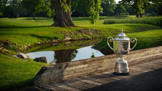 The Wanamaker Trophy neat the sixth and seventh holes at Oak Hill Country Club