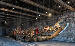 The Turkish Pavilion, in Arsenale's Sale d'Armi, takes its cue from port cities and docklands, and hangs a deconstructed boat from the ceiling