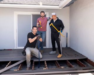 laurence fishburne and the property brothers putting together an outdoor living room for celebrity IOU