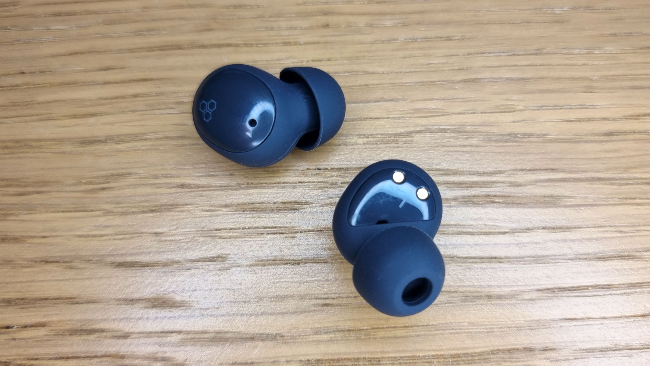 a picture of the Final ZE500 earbuds laid out on a table