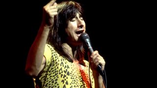 Steve Perry on stage with Journey in 1981