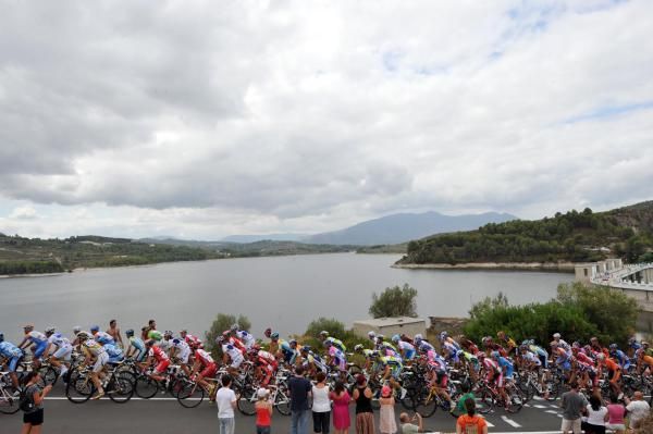 The riders speed along in stage eight.
