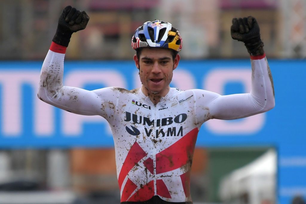 OVERIJSE BELGIUM JANUARY 24 Arrival Wout Van Aert of Belgium and Team JumboVisma Celebration during the 61st Druivencross World Cup 2021 Mens Elite Mud UCICX CXWorldCup Ostend2021 on January 24 2021 in Overijse Belgium Photo by Luc ClaessenGetty Images