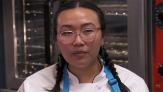Nini with her braids on Top Chef.